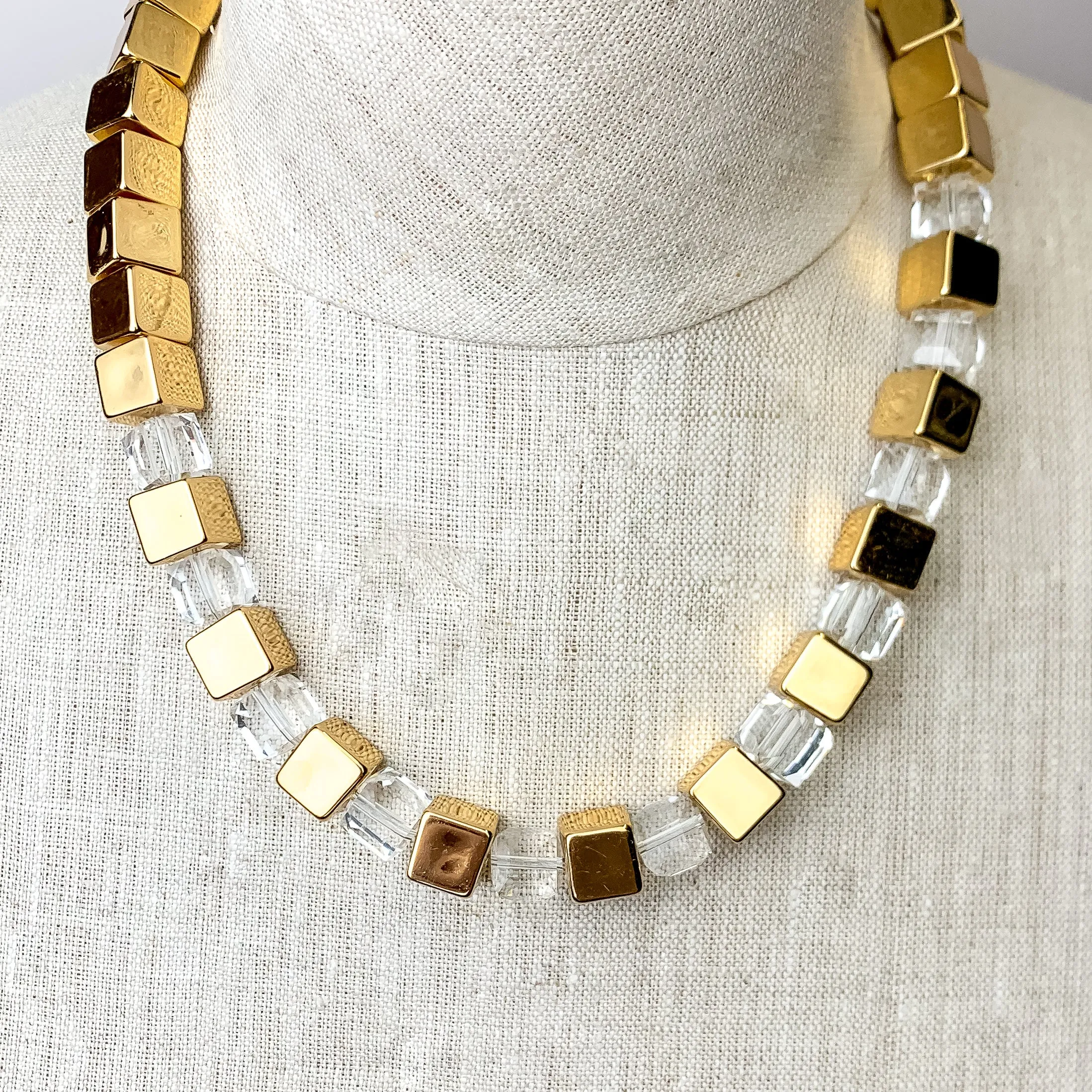 Fashionably Late Gold Tone Cubed Necklace in Clear